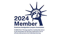 AILA 2024 membership badge with Statue of Liberty head silhouette and “2024 Member” text.